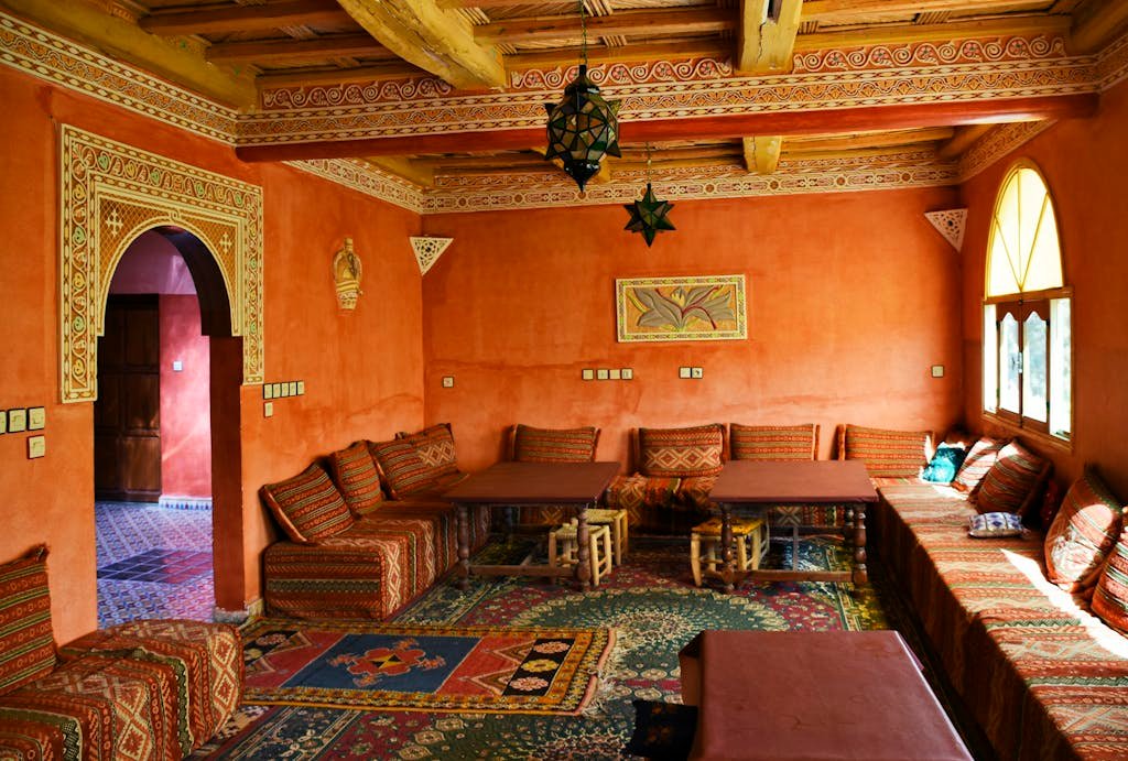 brown couches with Moroccan rug