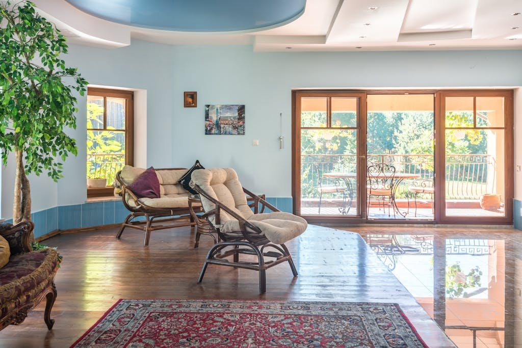 Oushak rug and chairs on the floor