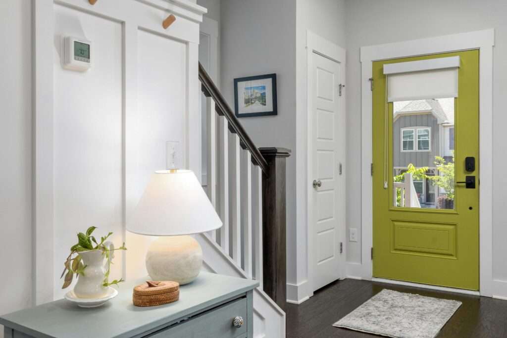 a beautiful entryway with runner rug