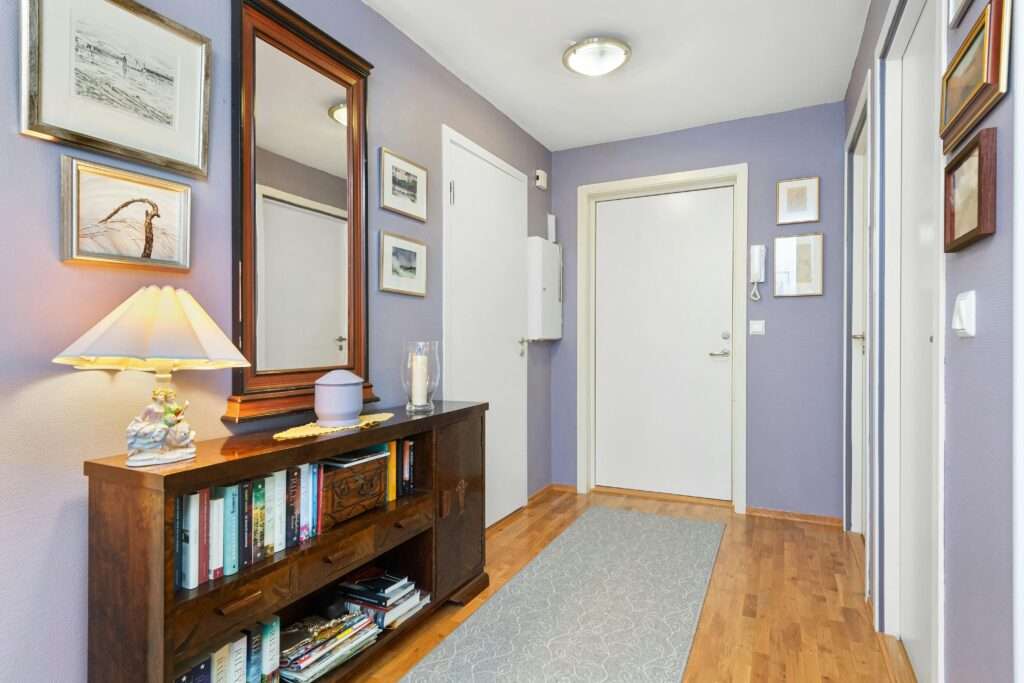 a beautiful entryway with runner rug