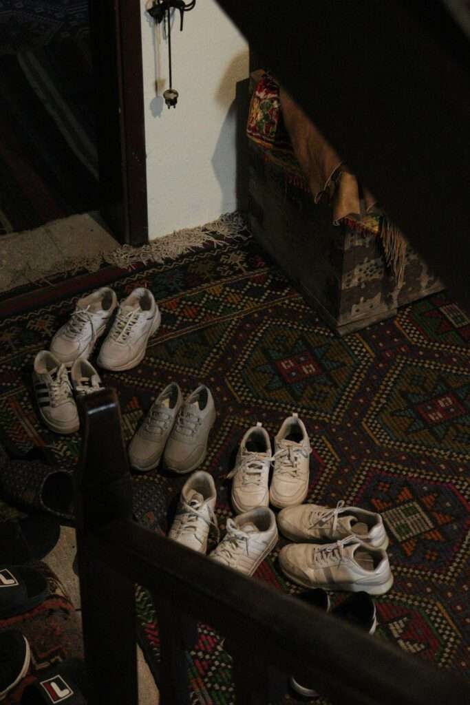 Shoes on runner rug